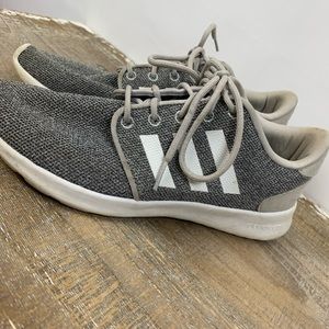 Adidas cloud-foam tennis shoes.